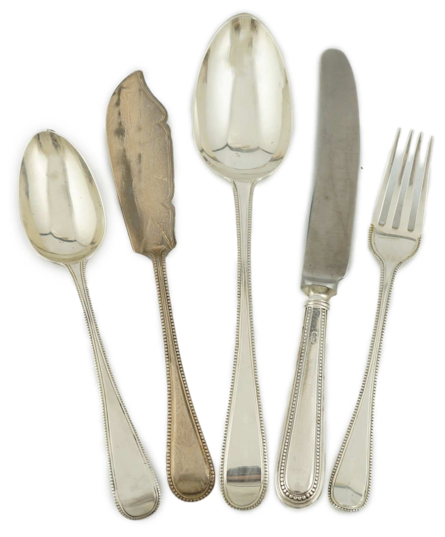 A matched part canteen of Victorian silver Old English beaded pattern flatware, by George Adams